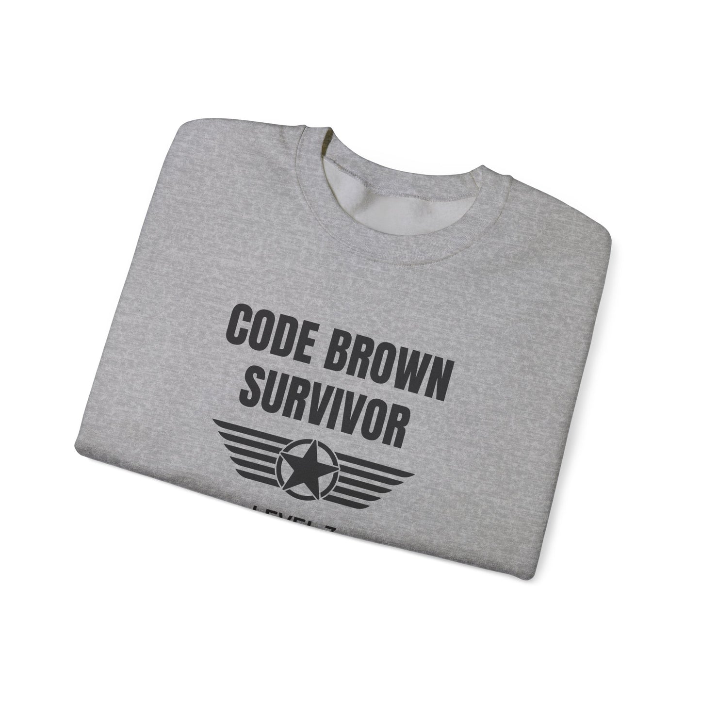 Funny nurse sweatshirt with quote “Code Brown Survivor,” worn by exhausted RN holding coffee and silently reliving bowel-related trauma
