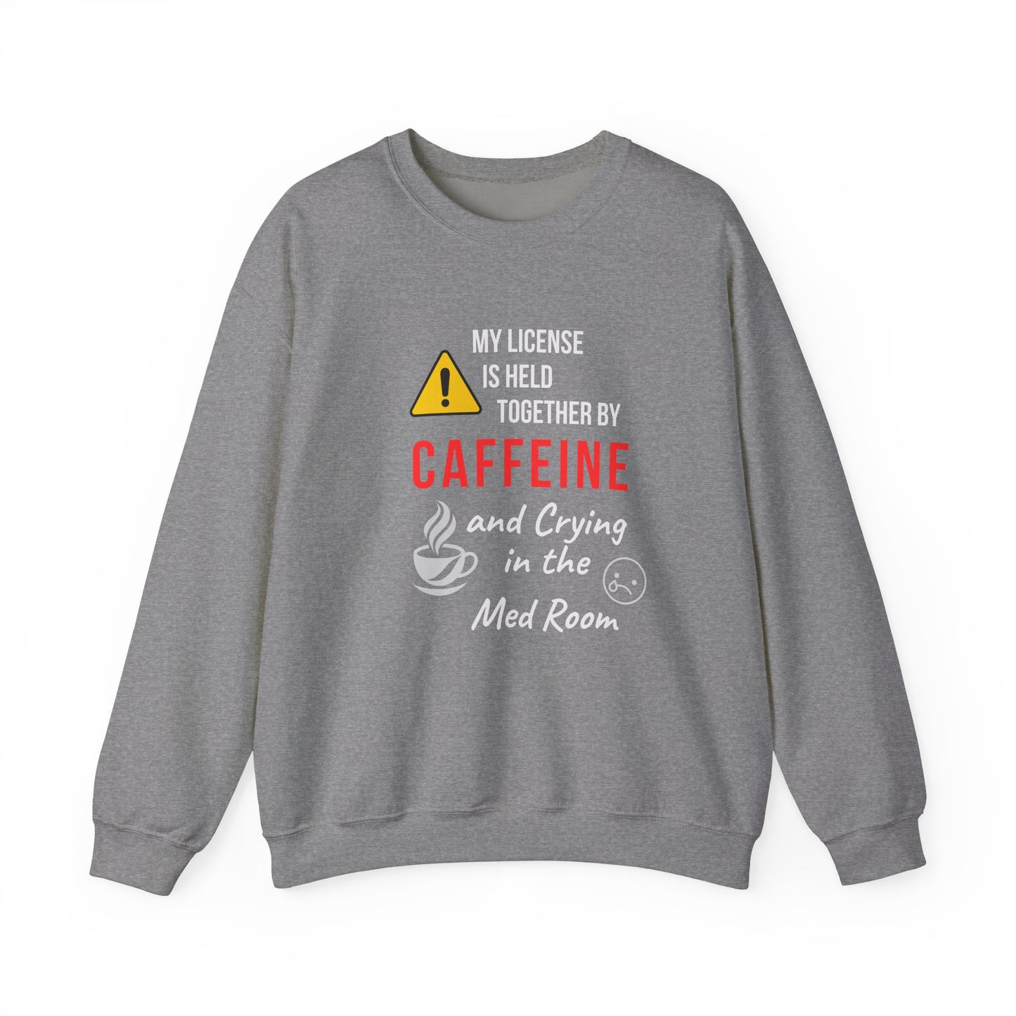 Funny nurse sweatshirt with quote “Held Together by Caffeine and Crying,” worn by exhausted RN mid-shift meltdown in breakroom