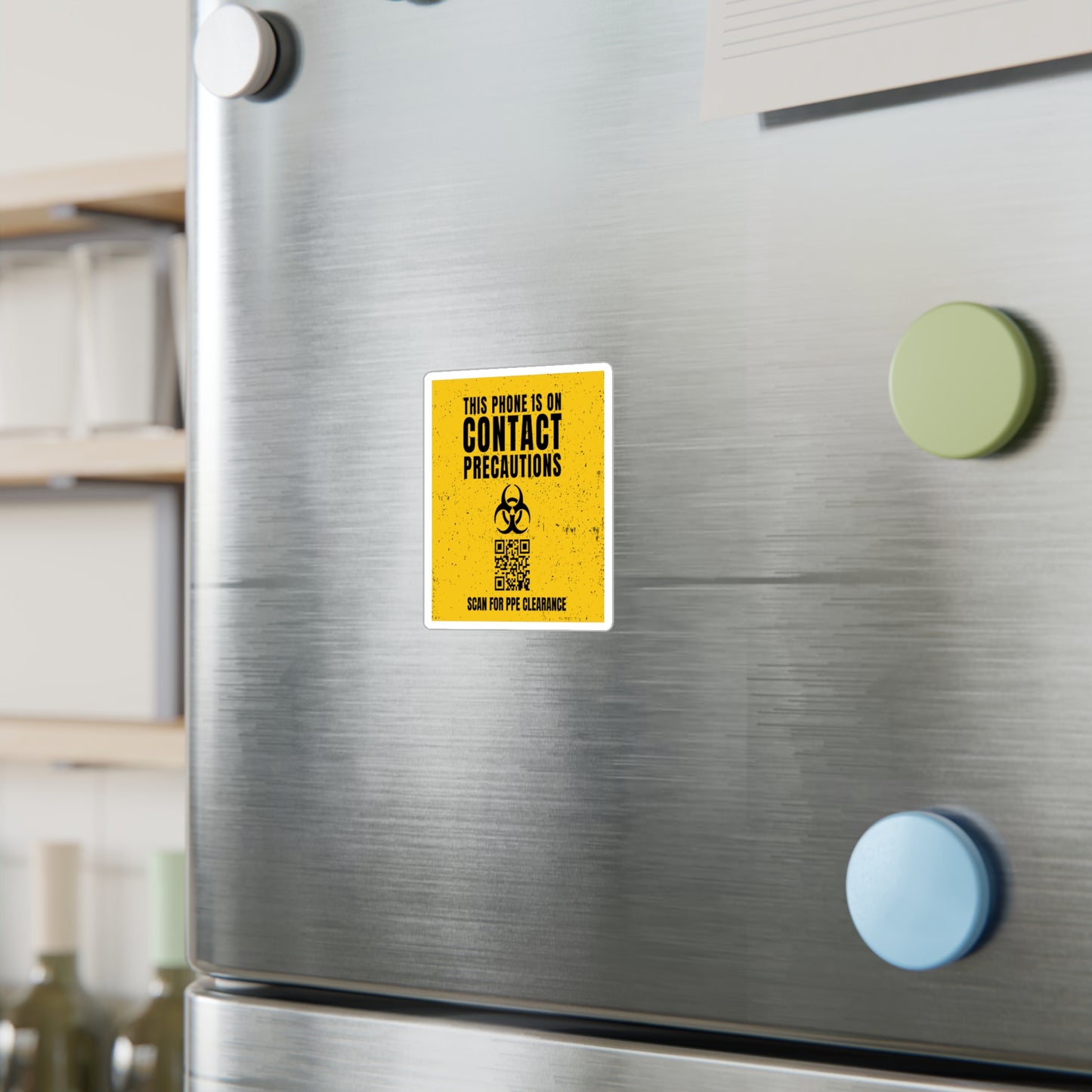Yellow sticker positioned on silver fridge door, styled like an infectious disease unit alert