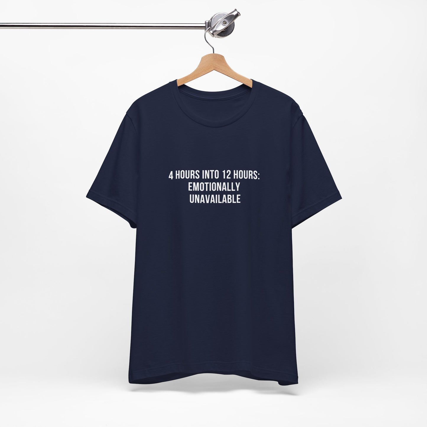 Flatlay of navy blue version of the “Emotionally Unavailable” nurse tee.