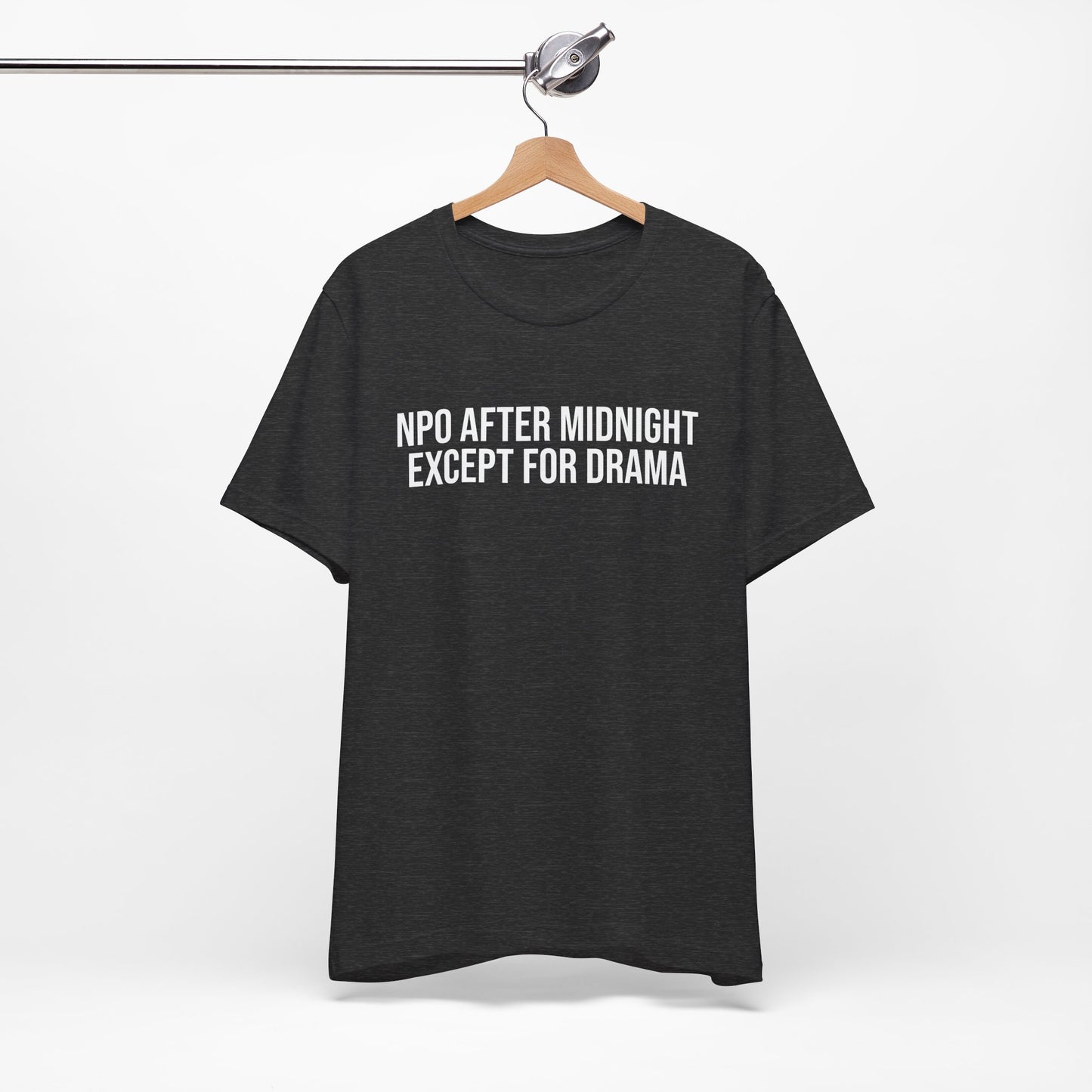 gray burnout tee on hanger featuring the phrase “NPO AFTER MIDNIGHT, EXCEPT FOR DRAMA.”