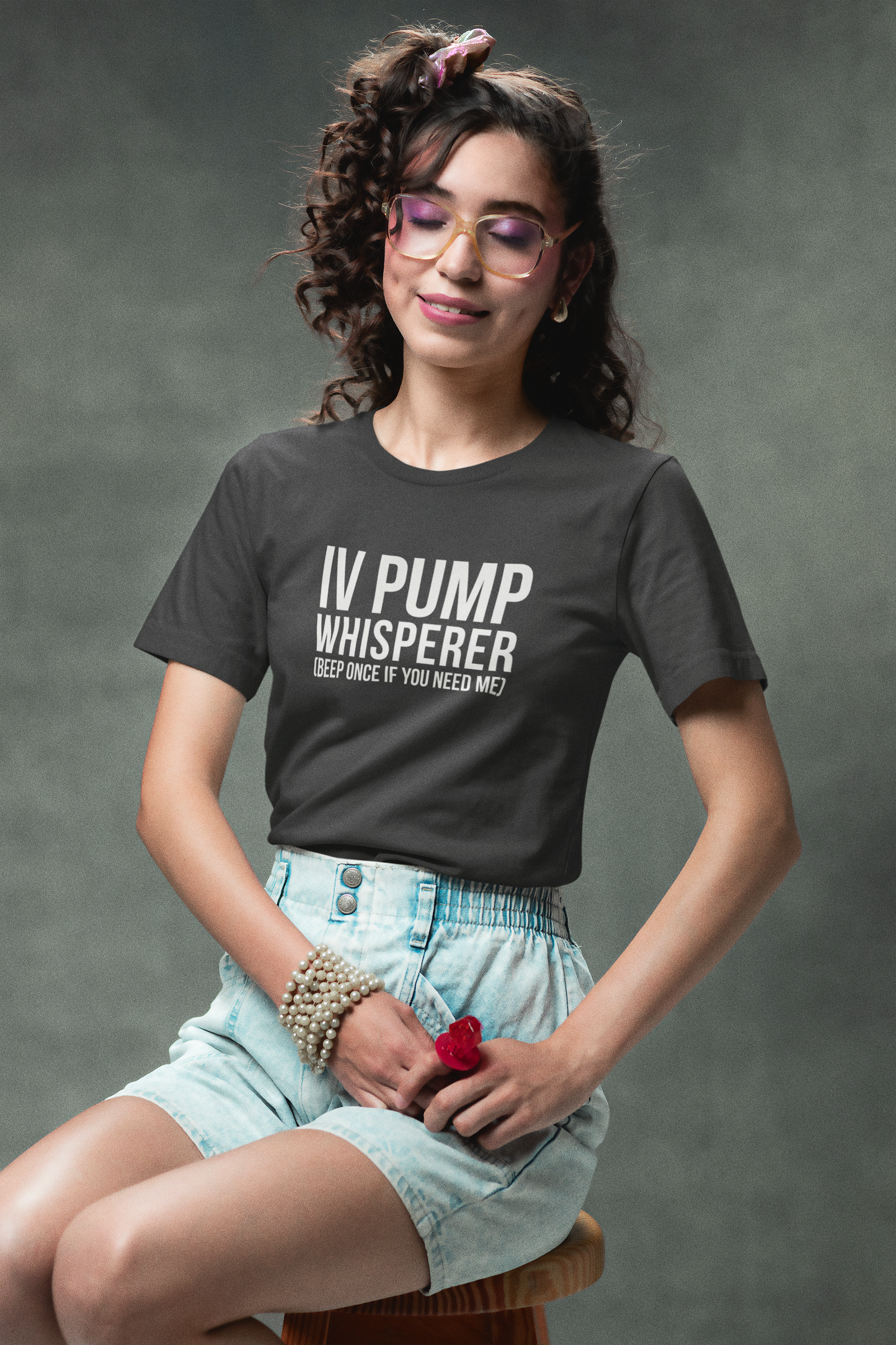 Nurse styled the IV tee with a dressy skirt, posing confidently.