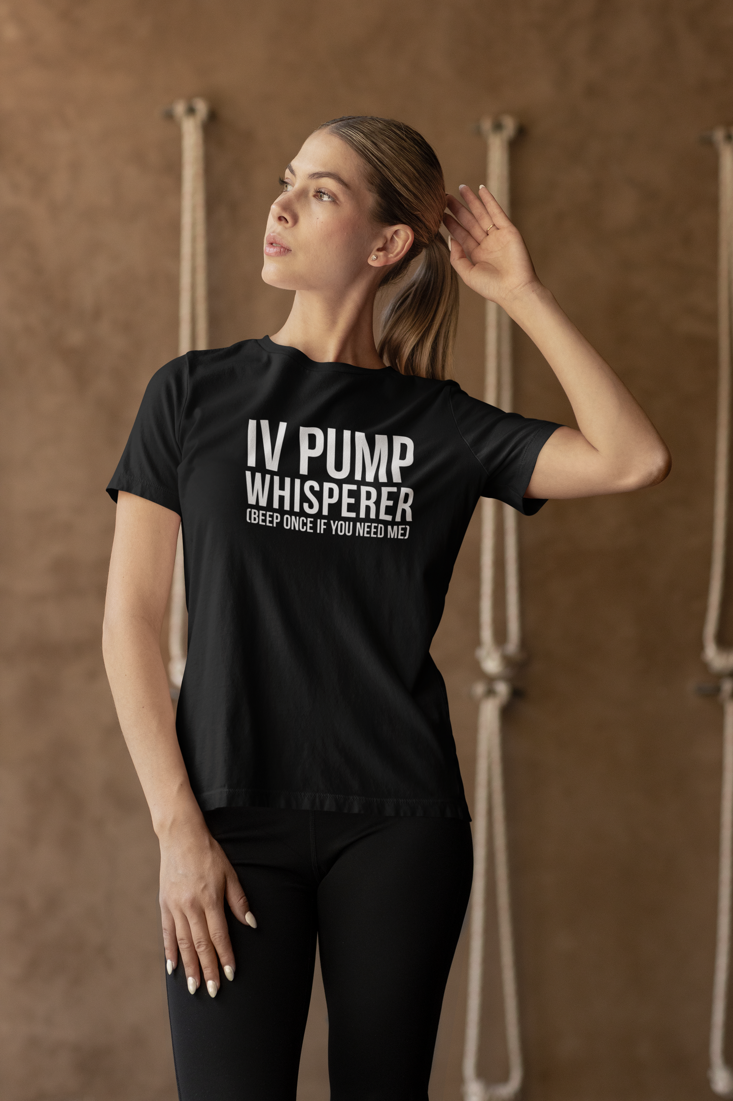 Nurse styled the IV tee with yoga pants, posing confidently.