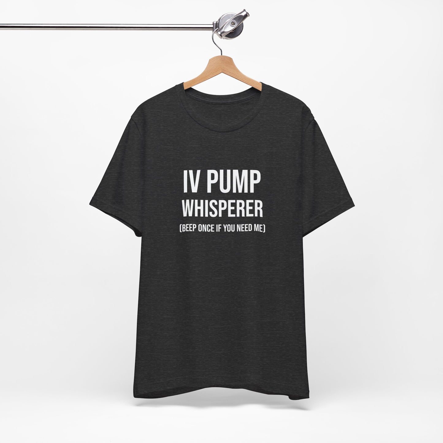 Flat lay of the black IV humor tee hung for product display.