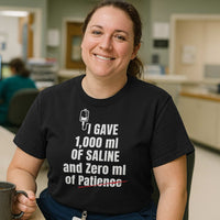 Nurse in scrubs laughing, wearing "I Gave 1,000 ml of Saline and Zero ml of Patience" shirt, hospital background.