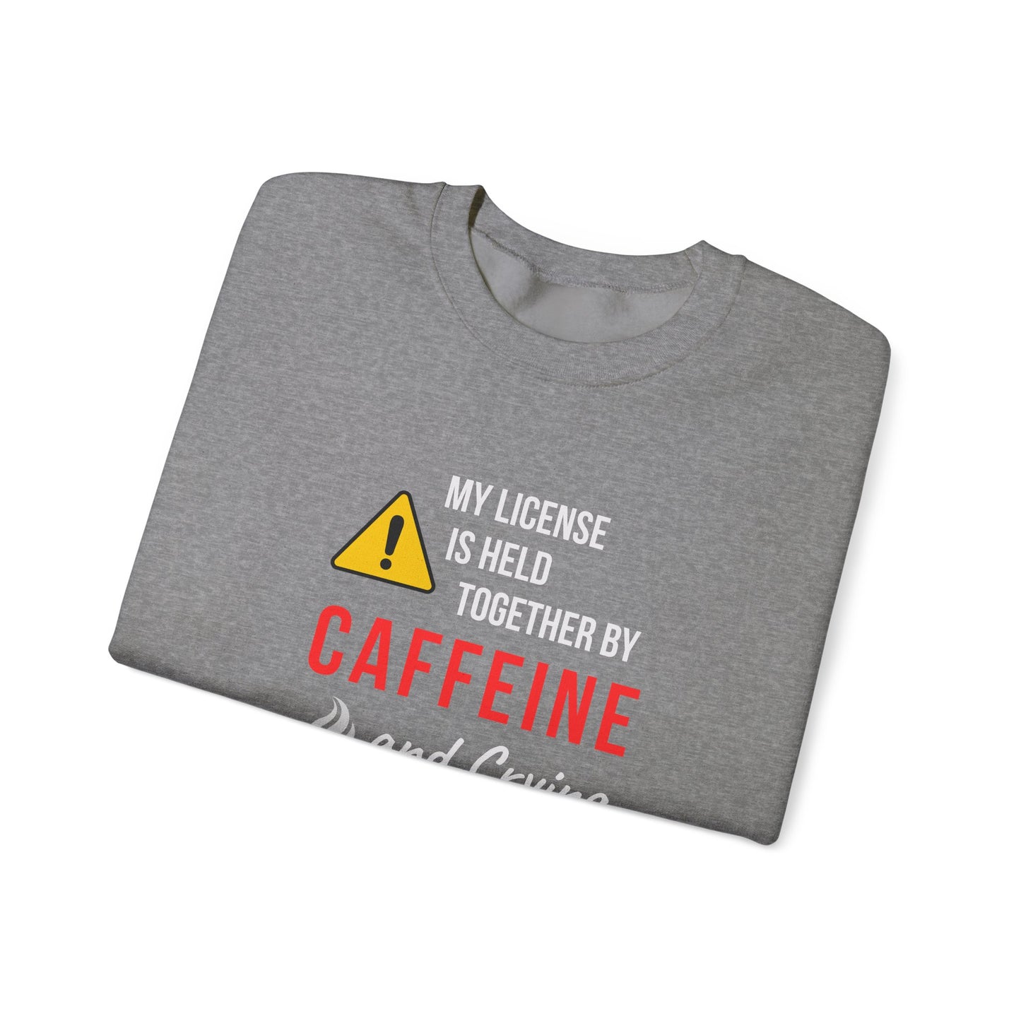 Funny nurse sweatshirt with quote “Held Together by Caffeine and Crying,” worn by exhausted RN mid-shift meltdown in breakroom
