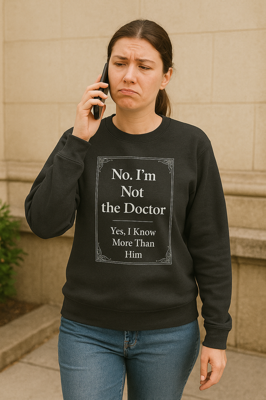 Funny black nurse sweatshirt with quote “Not the Doctor. Just Smarter,” worn by confident RN during shift rounds
