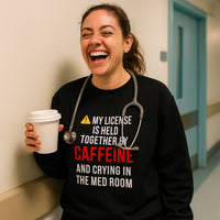 ⚠️ “Held Together by Caffeine & Crying ⚕️ | Ultimate Burnout Nurse Sweatshirt”