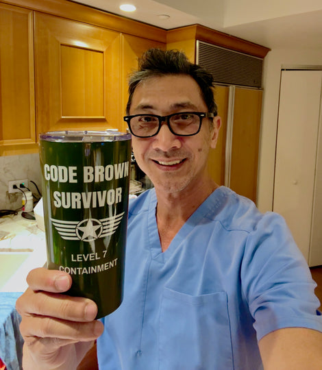 Funny 20oz stainless nurse tumbler with “Code Brown Survivor” quote, held by exhausted RN mid-shift with dead eyes and caffeine grip