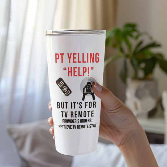 Hand holding a white nurse tumbler that says “PT YELLING HELP! BUT IT’S FOR THE TV REMOTE” in a bright, cozy living room.